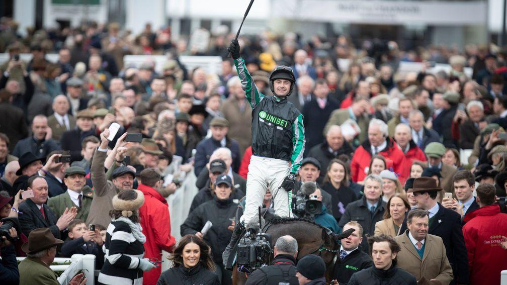 Nico de Boinville is triumphant aboard Altior after the Champion Chase