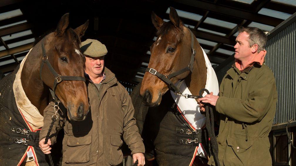 Colin Tizzard (left) with Cue Card and Joe Tizzard with Thistlecrack at Venn farm stables in Dorset in November