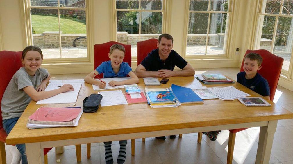 Richard Johnson takes on the role of teacher to homeschool daughter Willow and sons Caspar and Percy (right)
