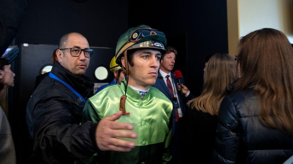 Man in the middle: Christophe Soumillon heads out to ride Barkaa in the Poule d'Essai des Pouliches after leading protests against the state of the racing surface at Longchamp