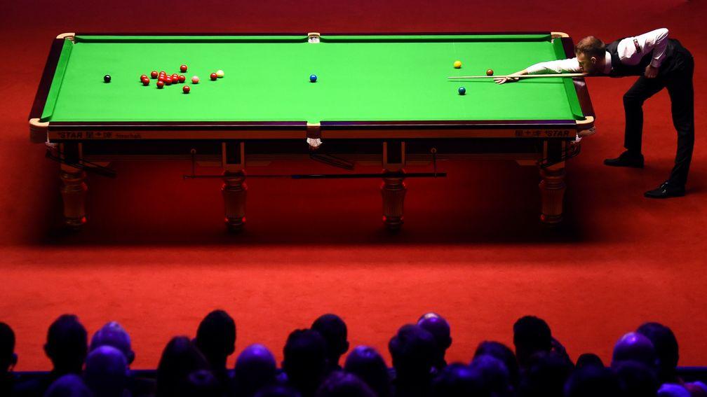 Judd Trump plays a shot during the final the 2019 Betfred World Snooker Championship