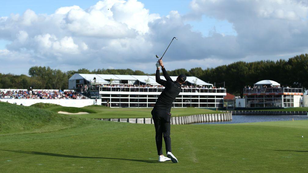 Chris Wood fires at the 18th green during his third round