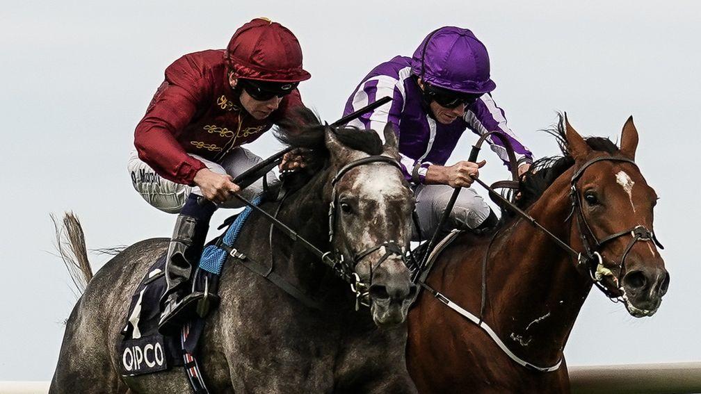 Roaring Lion (left) gets on top in his battle with Saxon Warrior in the Irish Champion Stakes