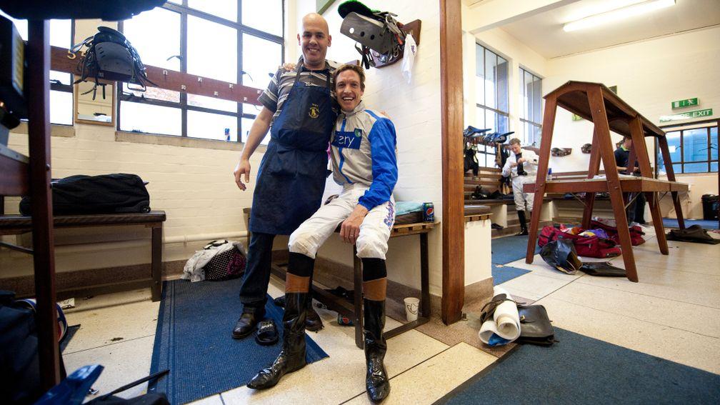 Valet David Mustow, seen here with Richard Hughes at Windsor on the day in 2012 when the former champion jockey rode seven winners
