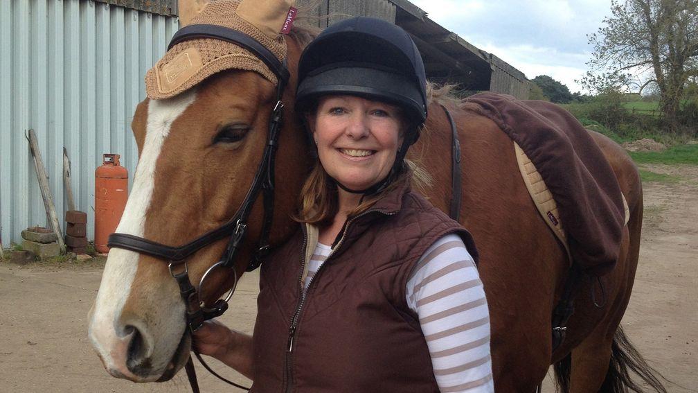 Sally Bentley and her ex-racehorse Magical Lasso, who was admitted to hospital after eating neat feed