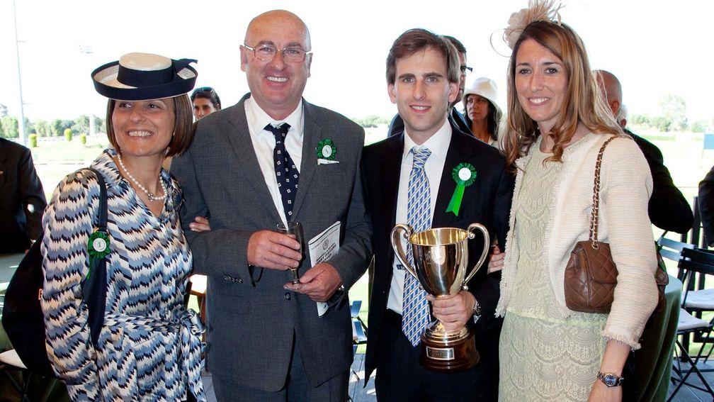Massimo Parri (second left) with wife Letizia, and their son Giovanni and his now-wife Francesca, pictured after the 2013 Derby Italiano won by Biz The Nurse