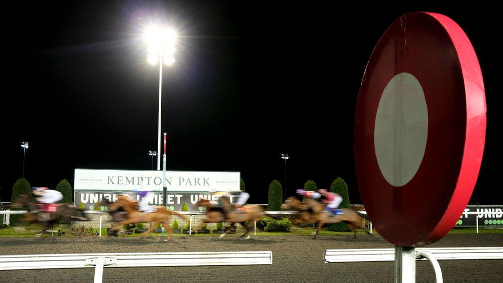 SUNBURY, ENGLAND - JANUARY 06: A general view as runners pass the winning post at Kempton Park Racecourse on January 06, 2021 in Sunbury, England. Due to the Coronavirus pandemic, owners along with the paying public will not be allowed to attend the meeti