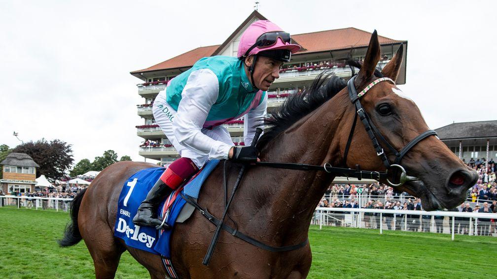 Enable and Frankie Dettori trot past the grandstands after an emotional Yorkshire Oaks success