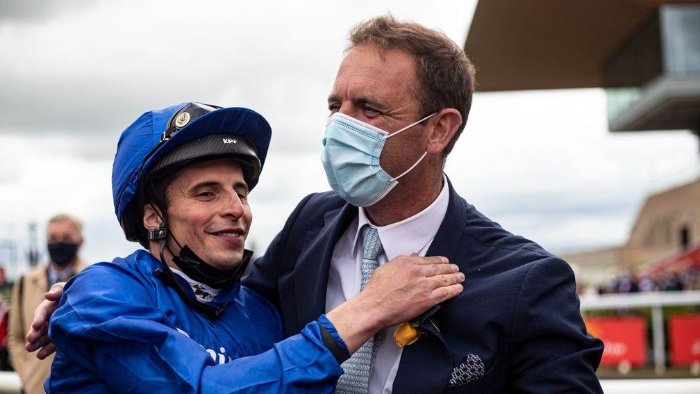 William Buick and Charlie Appleby embrace after combining to win the Irish Derby
