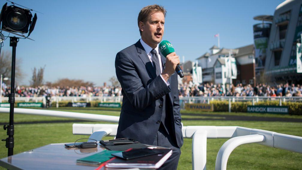 ITV anchorman Ed Chamberlin broadcasts from Aintree