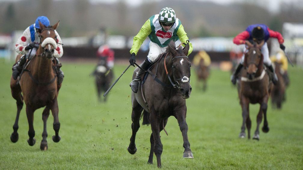 'The Tank' is back: Denman and Ruby Walsh storm to success in the 2009 Hennessy Gold Cup, carrying 22lb more than runner-up What A Friend (left)