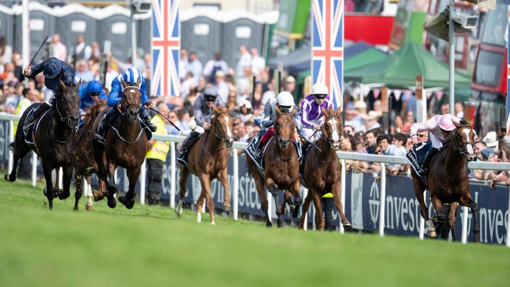 Anthony Van Dyck (right) pushes ahead in a thrilling Derby finale