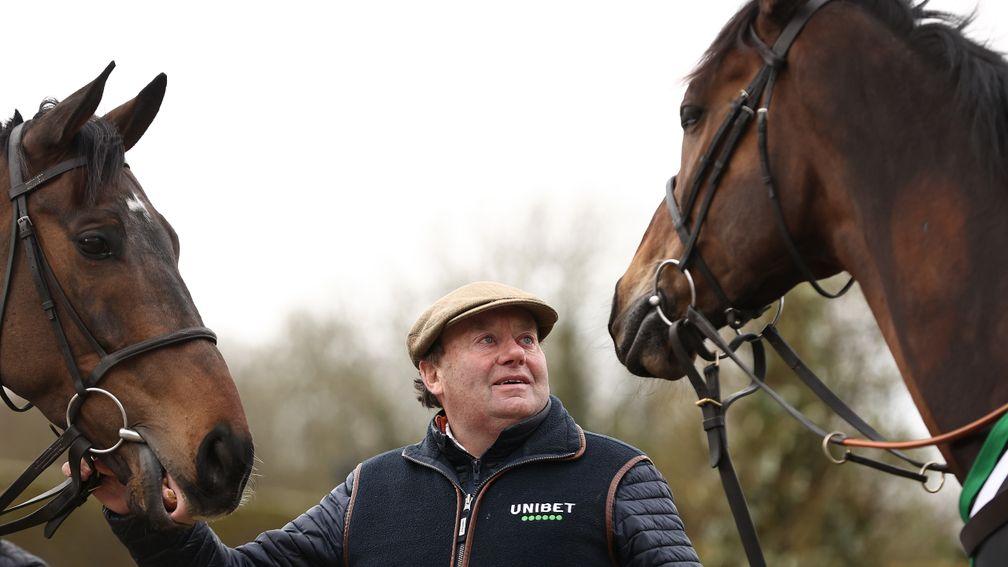 LAMBOURN, ENGLAND - FEBRUARY 21: Trainer Nicky Henderson parades Constitution Hill (L) and Jon Bon (R) during a Nicky Henderson Stable Visit at Seven Barrows on February 21, 2022 in Lambourn, England. (Photo by Ryan Pierse/Getty Images)