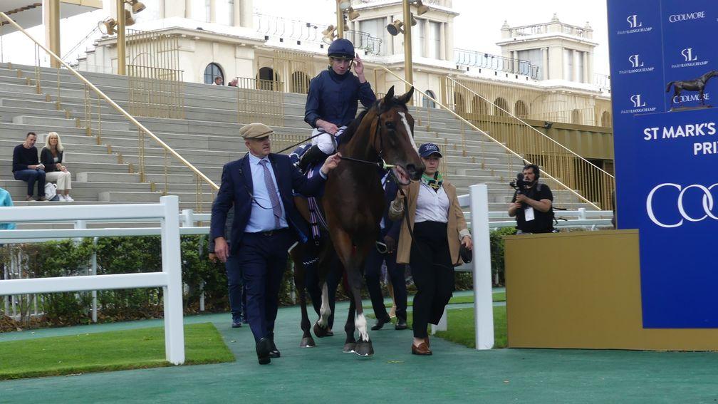 Above The Curve and Ryan Moore return after winning the Group 1 St Mark's Basilica Coolmore Prix Saint-Alary at Longchamp