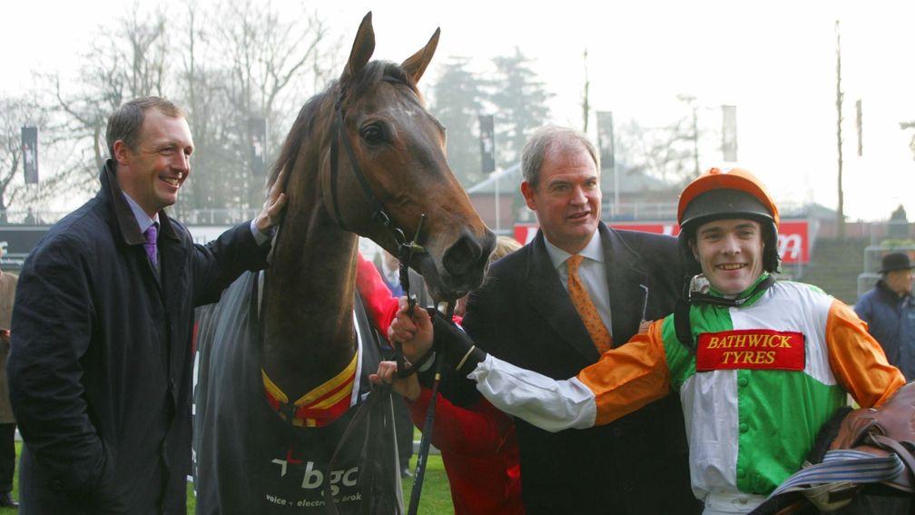Lough Derg and owner William Frewen (centre) with jockey Tom Scudamore and trainer David Pipe after winning the Grade 1 Long Walk Hurdle at Ascot in 2007