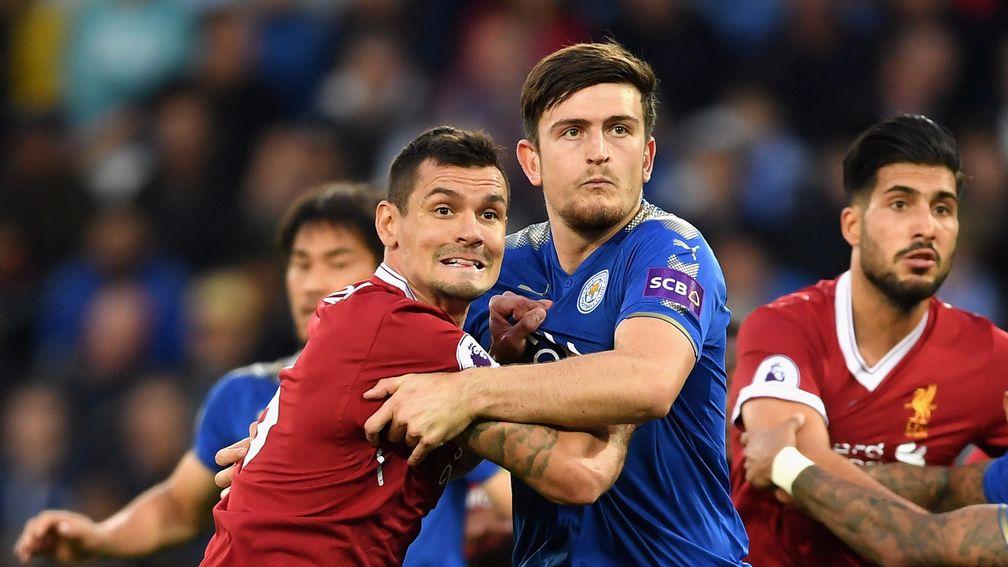 Dejan Lovren's (left) mistake cost Liverpool victory against Everton at Anfield in the league last season