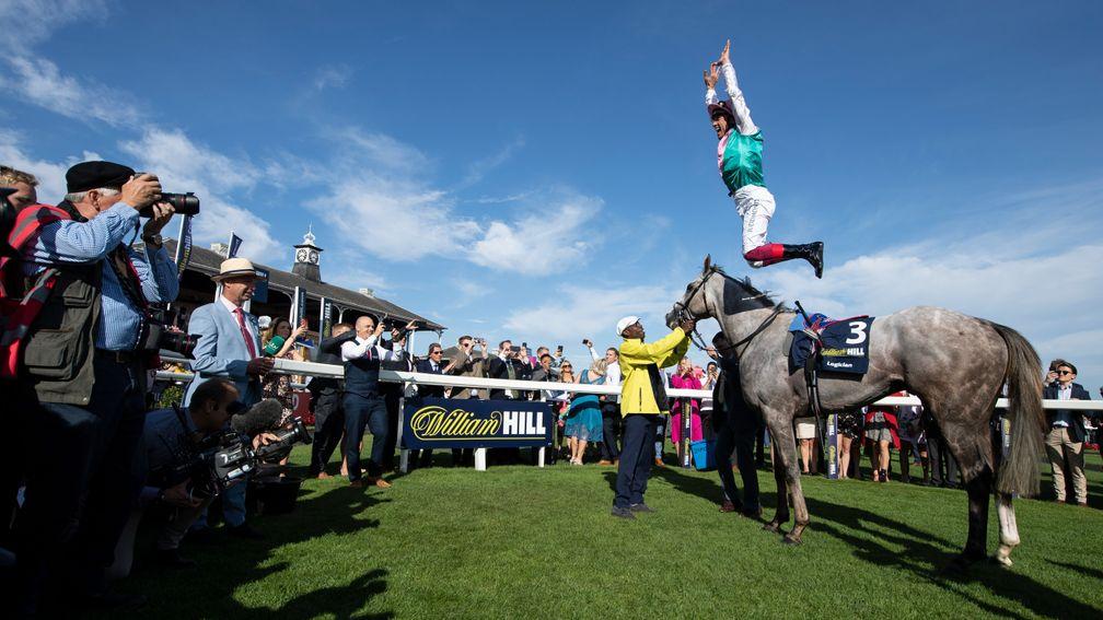 Dettori celebrates after winning the St Leger on Logician in 2019 for Juddmonte