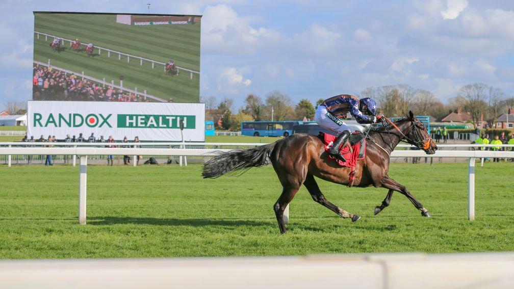 Dysart Enos romps clear at Aintree - as can be seen on the big screen behind her