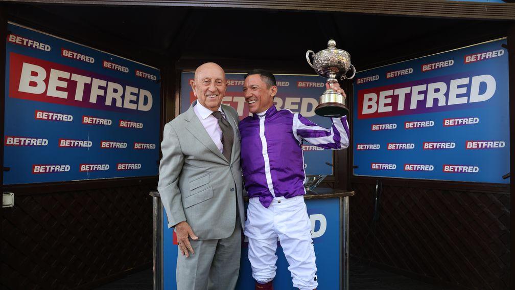 Frankie Dettori (right): lifts the Sandy Lane trophy alongside Betfred owner Fred Done