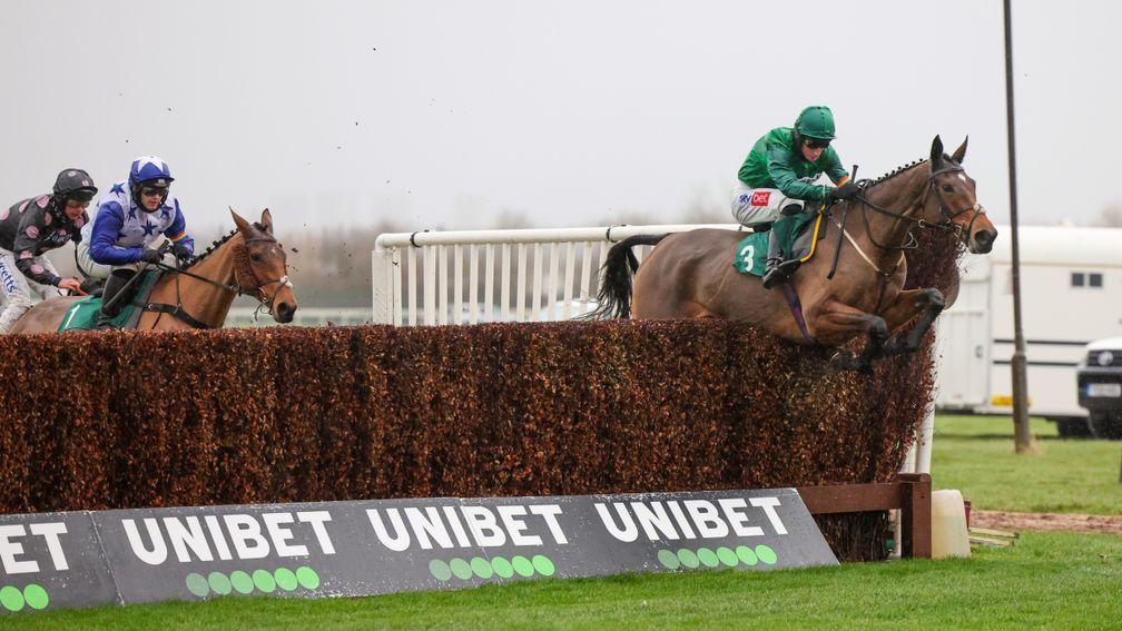 Zambella jumps a fence on her way to winning the Listed mares' chase