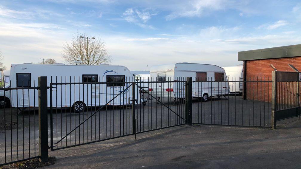 Warwick: travellers occupy a car park at the course