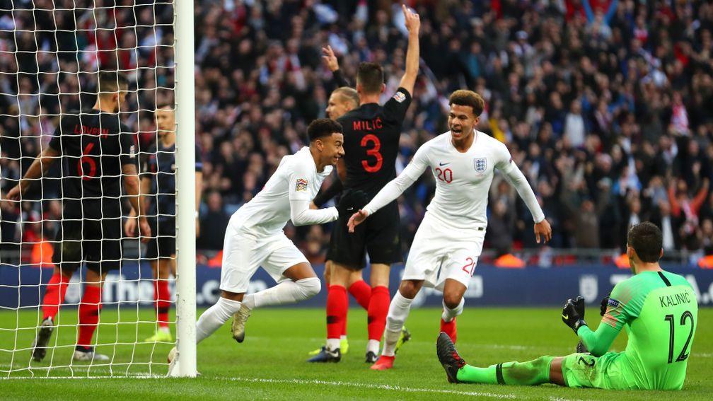 Jesse Lingard wheels away after scoring Eng;and's equaliser against Croatia