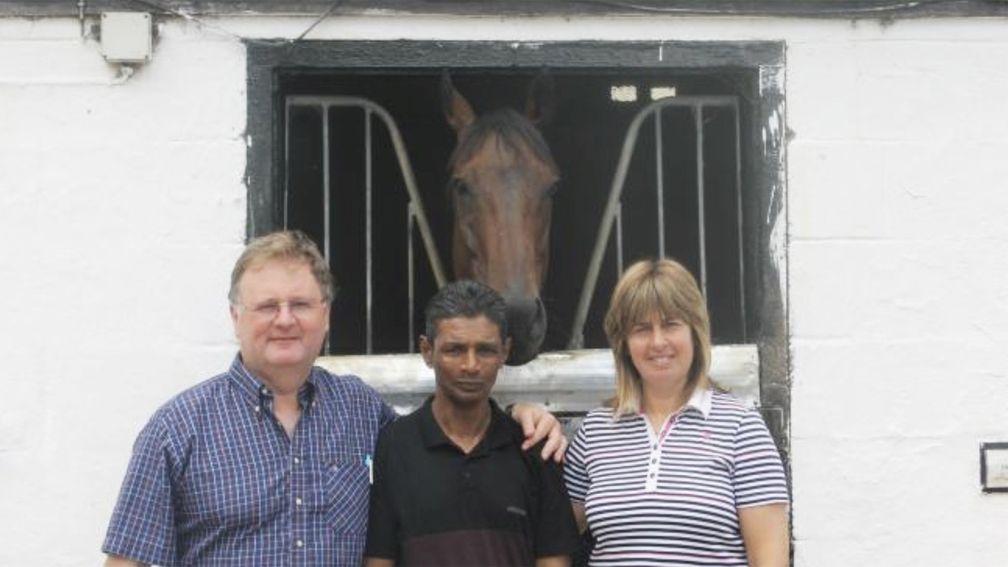 Carim Mohideen (centre) with Michael Dods (left) and the trainer's wife Carole