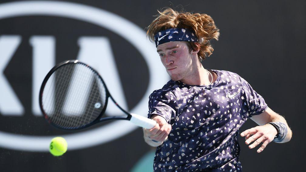 Andrey Rublev plays a forehand during his four-set third-round victory David Goffin