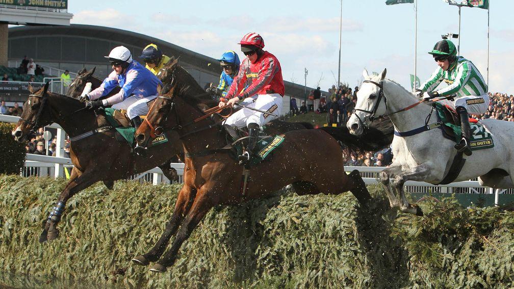 Tartan Snow (red) and Jamie Hamilton on the way to victory in the 2013 Foxhunters'