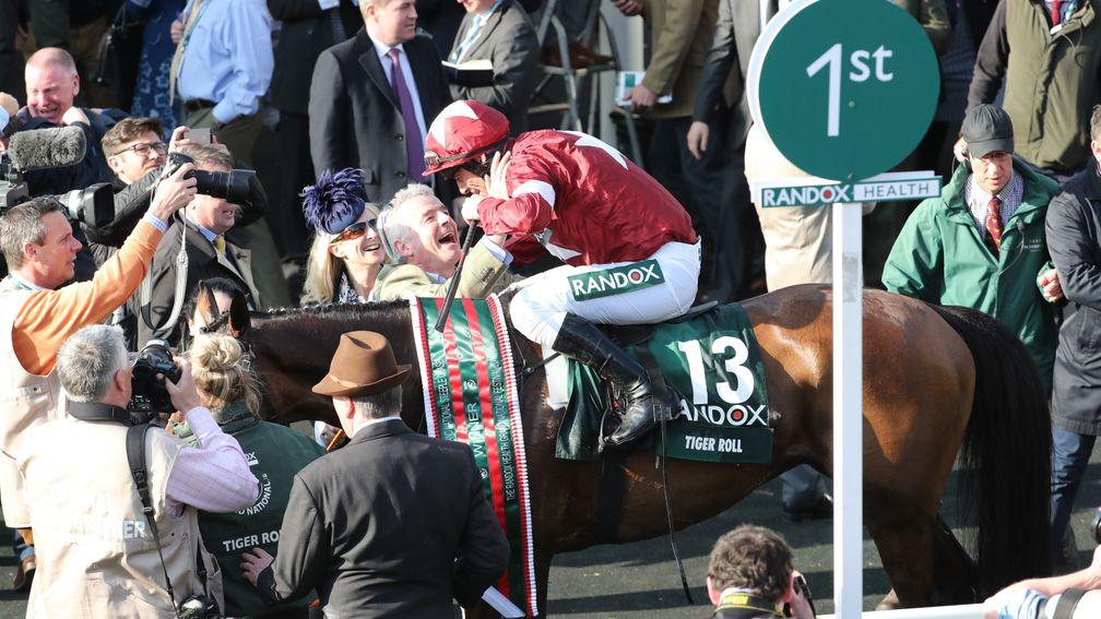 Michael O'Leary congratulates Davy Russell after his winning Grand National ride on Tiger Roll
