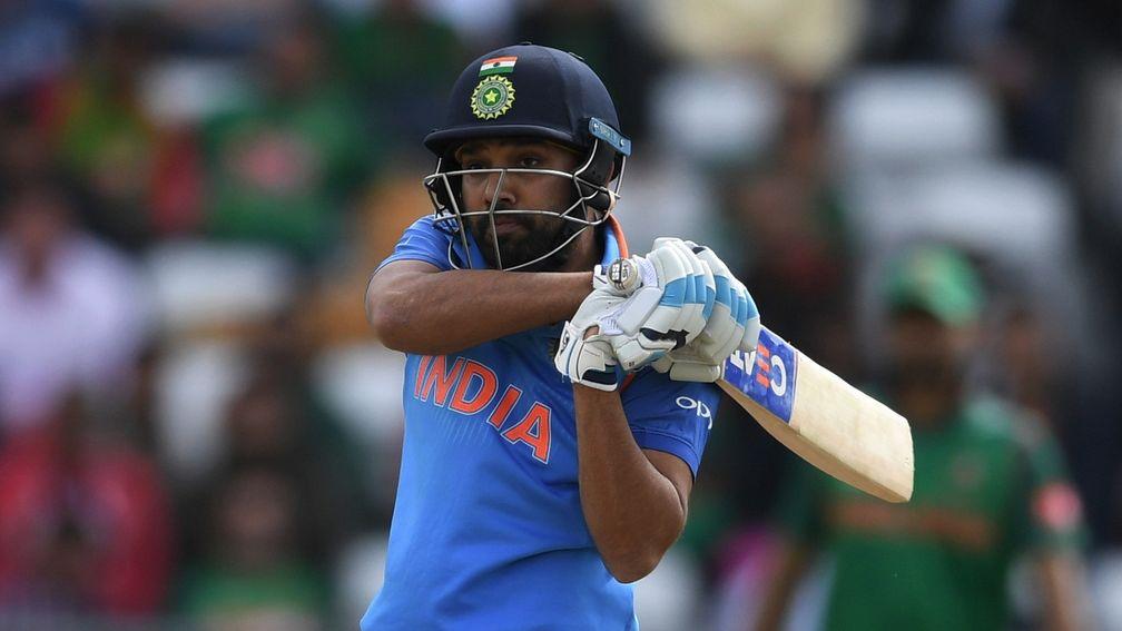 Rohit Sharma of India hits a six