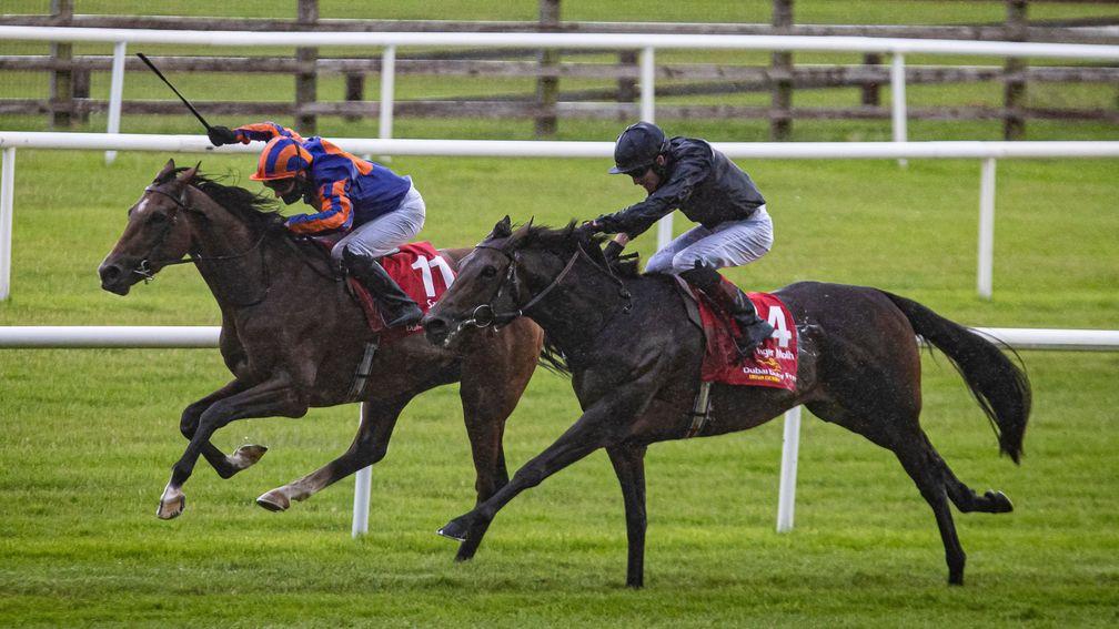 Santiago (left) fends off stablemate Tiger Moth to give Aidan O'Brien his 14th Irish Derby triumph