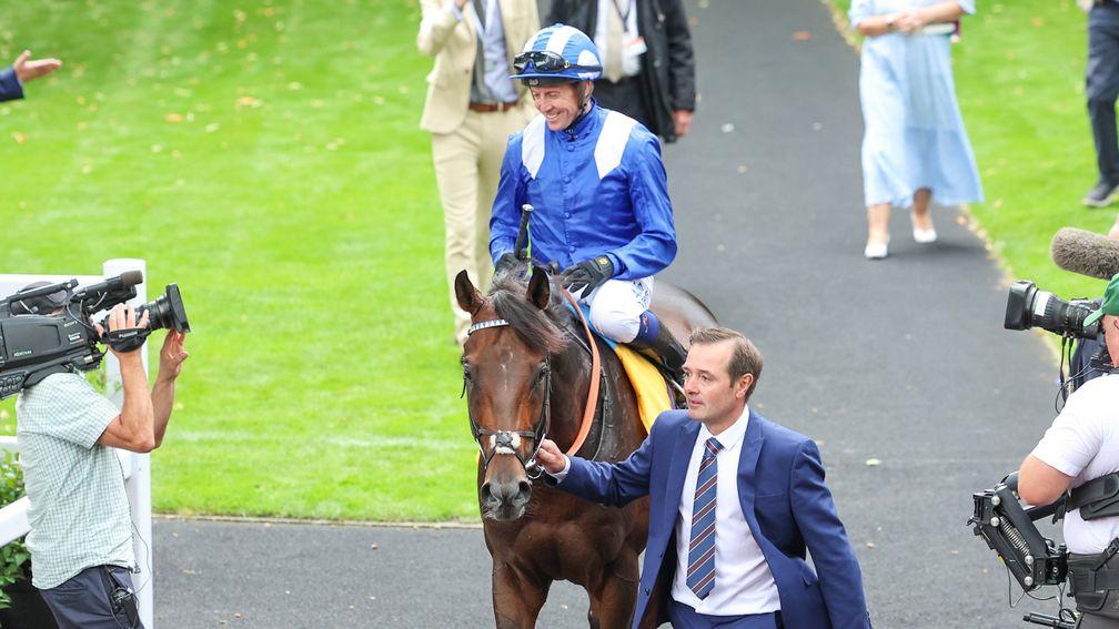 Minzaal returns to the winner's enclosure at Haydock after his sizzling Sprint Cup success