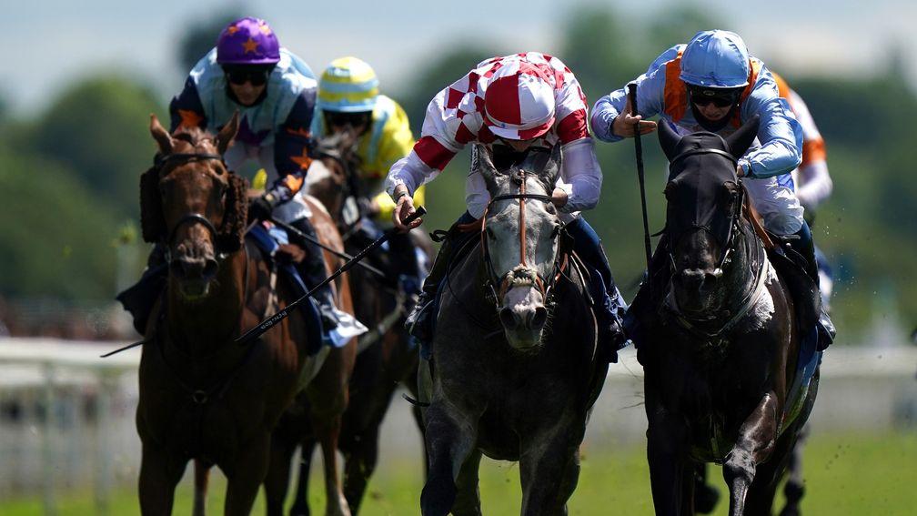 YORK, ENGLAND - JUNE 11: Civil Law ridden by jockey Ben Robinson (centre) wins the Churchill Tyres Handicap with Howzer Black ridden by jockey Shane Gray (right) second at York Racecourse on June 11, 2021 in York, England. (Photo by Tim Goode - Pool/Getty