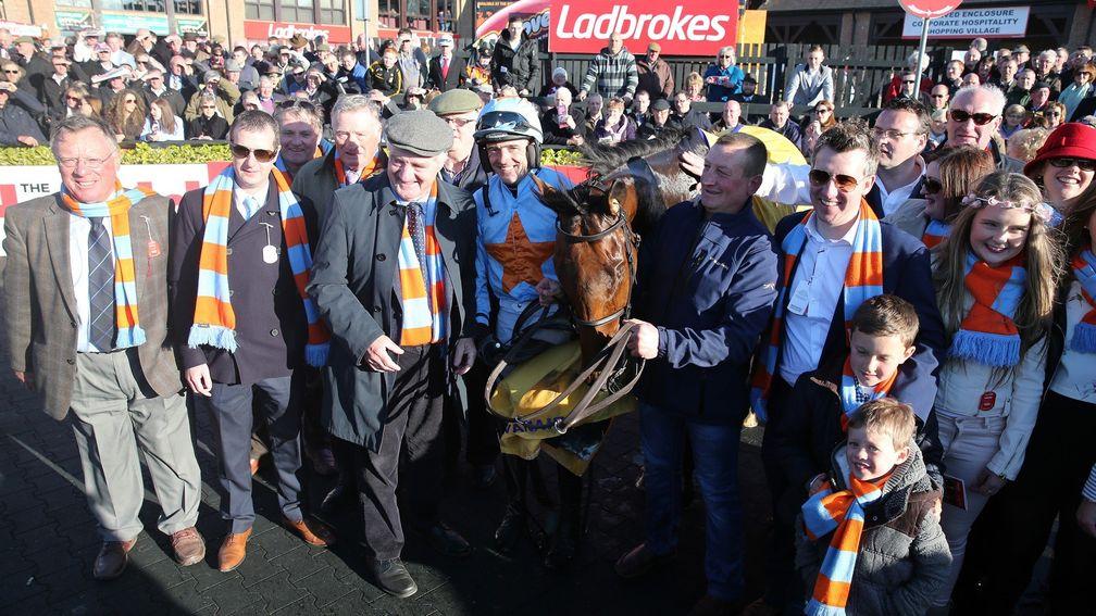 The O'Connell family: easily recognisable at the races through their blue and orange scarves
