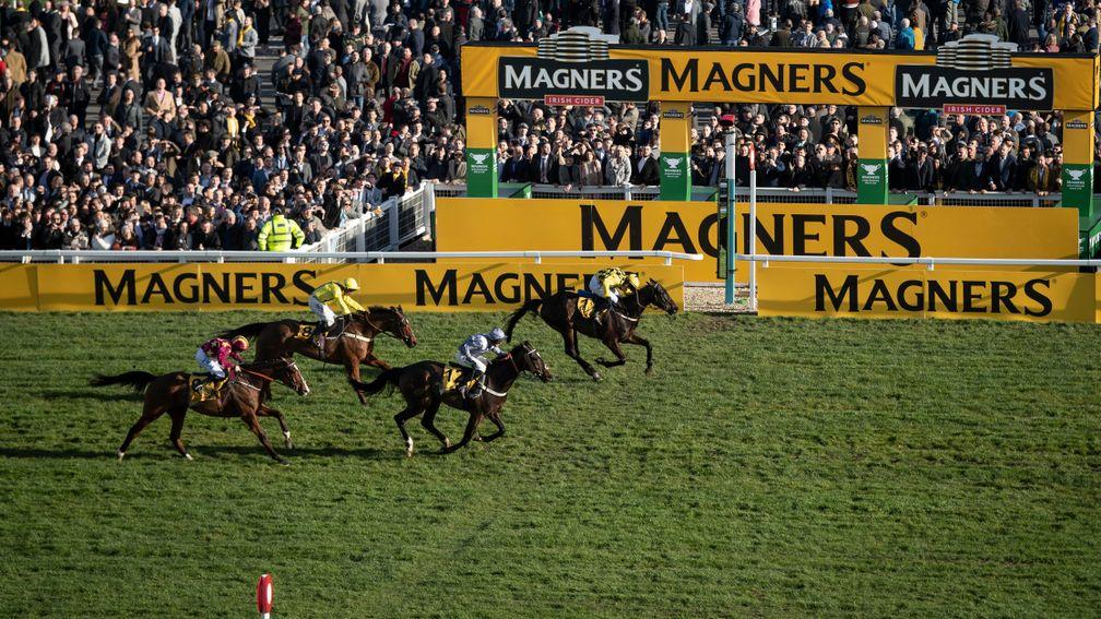 Al Boum Photo (far side) sees off Santini in a pulsating Cheltenham Gold Cup last year