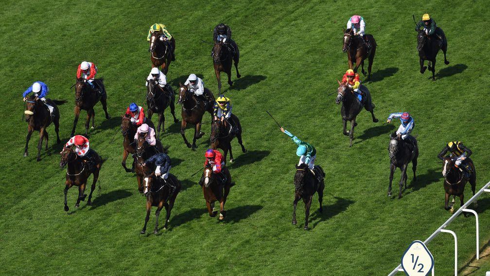 Con Te Partiro (green cap) wins the Sandringham on day two. But the concluding race went off some nine minutes late