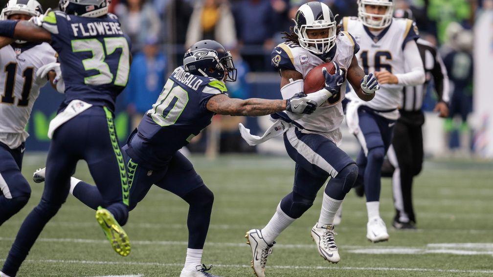 Ace LA Rams running back Todd Gurley stretches the Seattle defence
