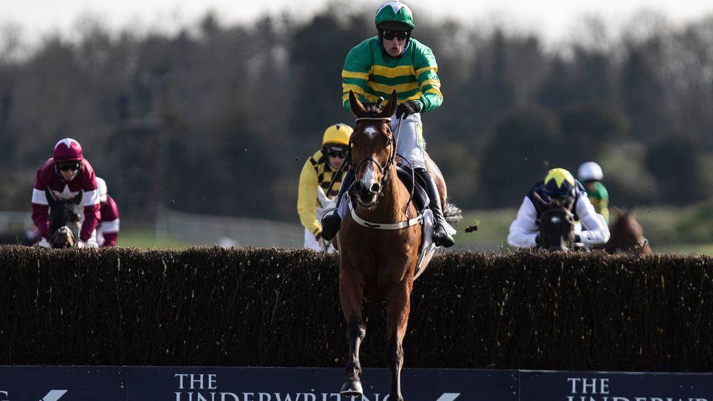 Janidil jumps the last to win the Grade 1 Underwriting Exchange Gold Cup Novice Chase