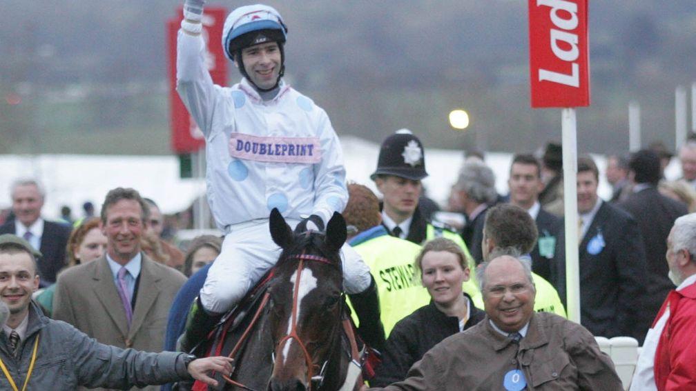 Happier times: David Arbuthnot (left) follows Oscar Park (Tom Doyle) and owner George Ward into the winner's enclosure following their win in the 2007 Pertemps Final at Cheltenham