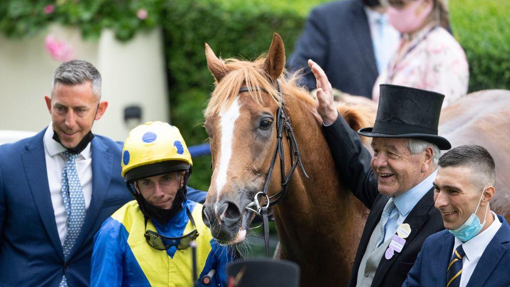 Sir Michael Stoute and Ryan Moore with Dream Of Dreams in the Ascot winner's enclosure