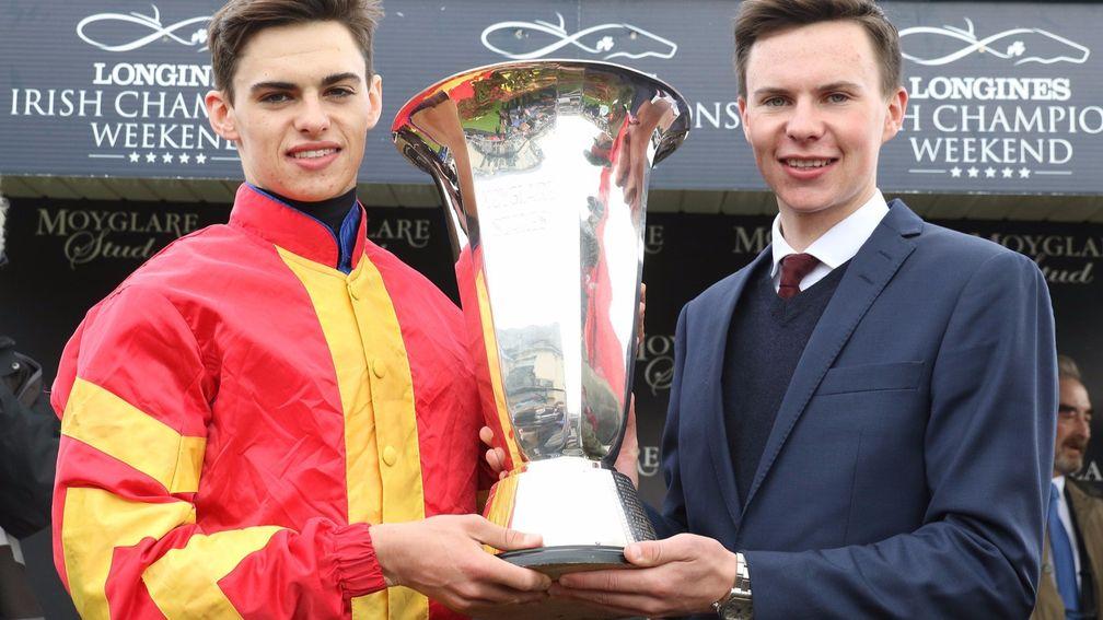 Donnacha and Joseph O'Brien with the Moyglare Stud Stakes trophy