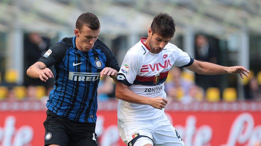 Genoa's Miguel Velosa (right) tussles with Inter's Ivan Perisic