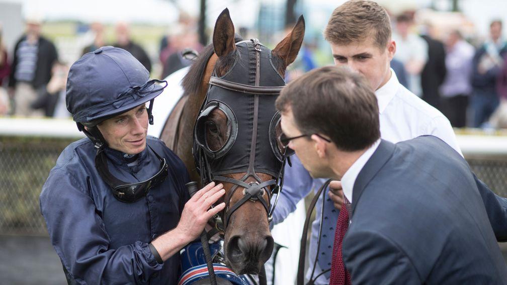 Ryan Moore and Aidan O'Brien with Washington DC after his victory in the Phoenix Stakes