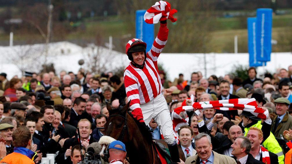 Barry Geraghty returns to the winner's enclosure after Forpadydeplasterer's memorable success in the Arkle in 2009