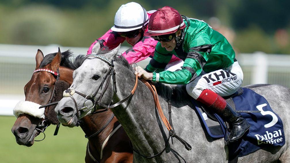 ASCOT, ENGLAND - AUGUST 07: David Egan riding Graphite (green, red cap) win The Dubai Duty Free Shergar Cup Challenge during the Dubai Duty Free Shergar Cup meeting at Ascot Racecourse on August 07, 2021 in Ascot, England. (Photo by Alan Crowhurst/Getty I