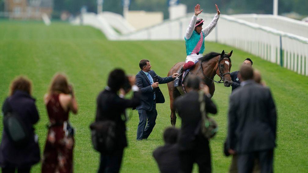 Photographers gather as Frankie Dettori celebrates after winning the 2019 King George VI & Queen Elizabeth Stakes