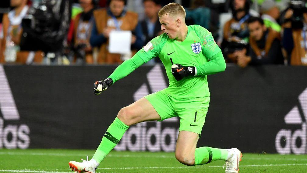 England goalkeeper Jordan Pickford celebrates after saving the fifth penalty from Carlos Bacca of Colombia
