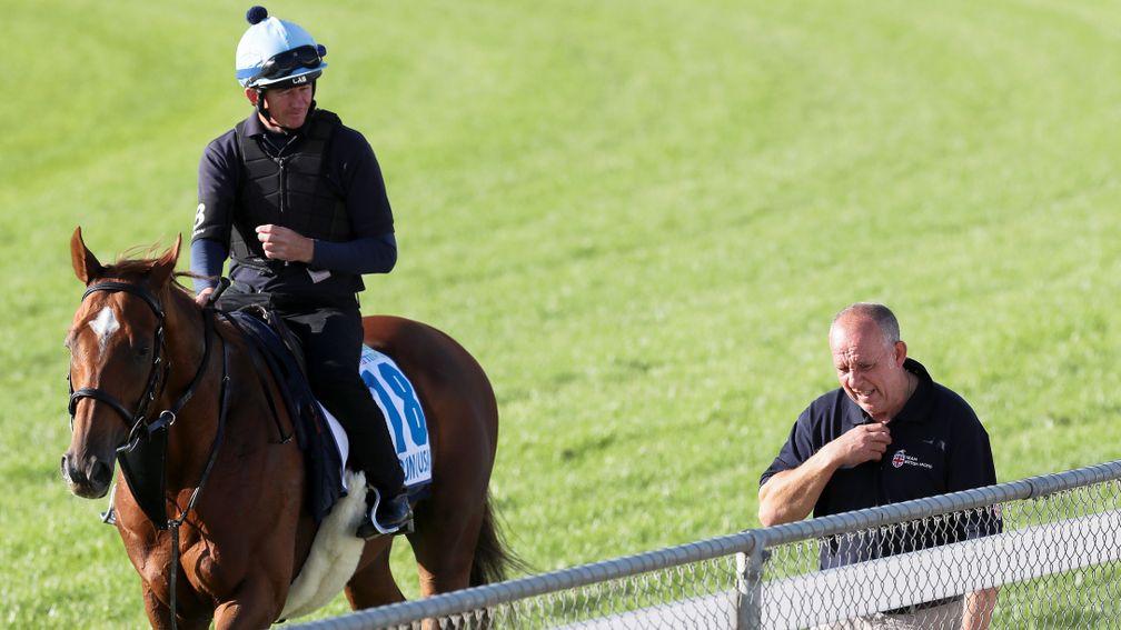 Red Verdon is accompanied by Robin Trevor-Jones during a trackwork session at Werribee