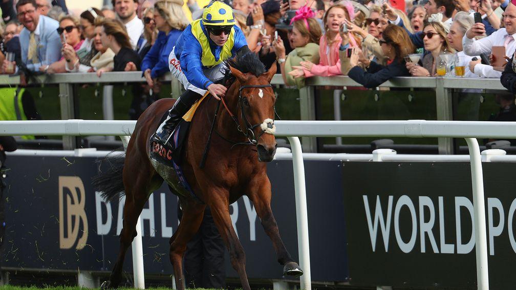 EPSOM, ENGLAND - JUNE 04: Richard Kingscote riding Desert Crown to victory in the Cazoo Derby during Cazoo Derby meeting at Epsom Racecourse on June 04, 2022 in Epsom, England. (Photo by Andrew Redington/Getty Images)